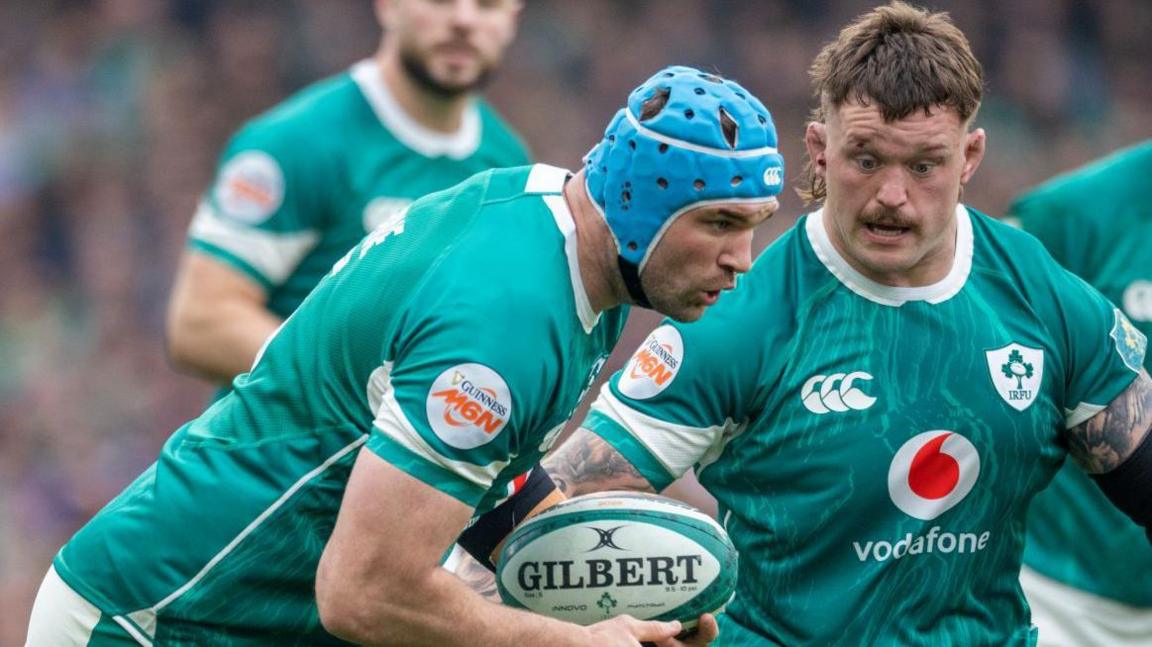 Andrew Porter (right) and Tadhg Beirne (left) in action for Ireland against France on Saturday