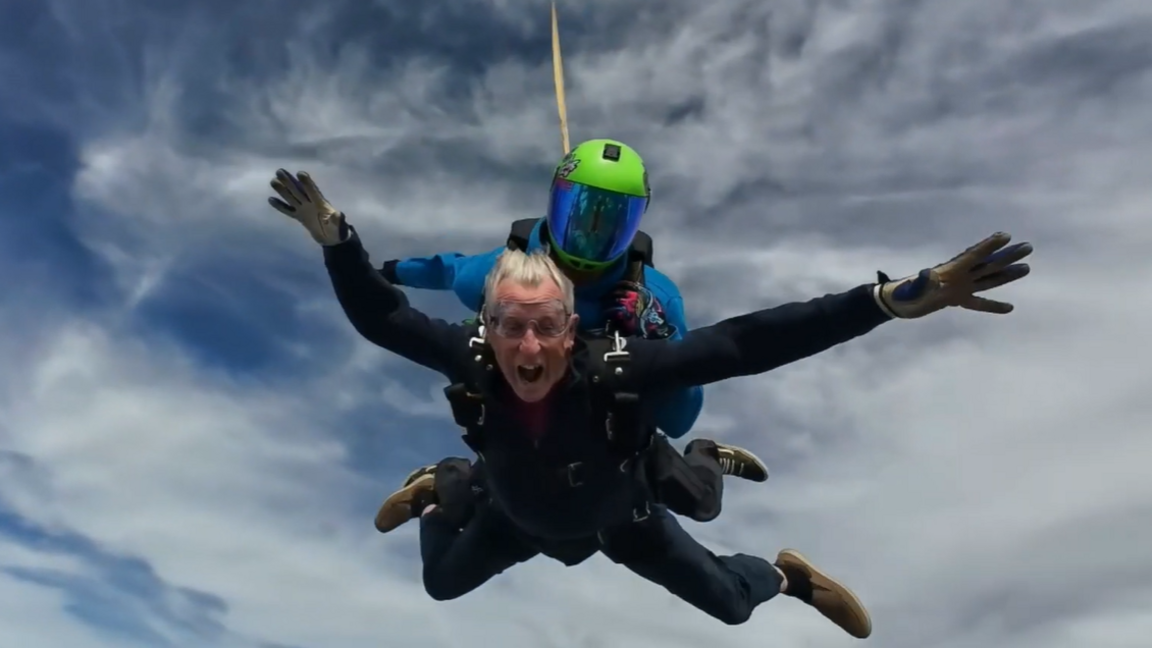A view of Peter Hill falling from the sky as part of a charity sky dive for Transforming Notts Together.