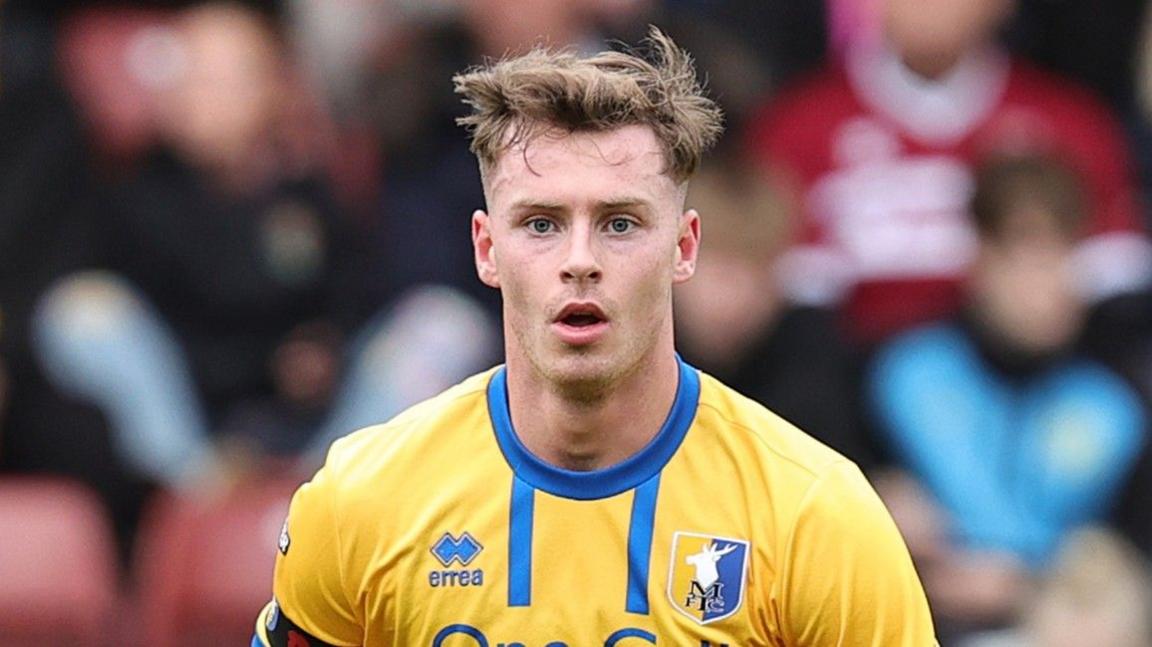 Jamie McDonnell in action for Mansfield Town