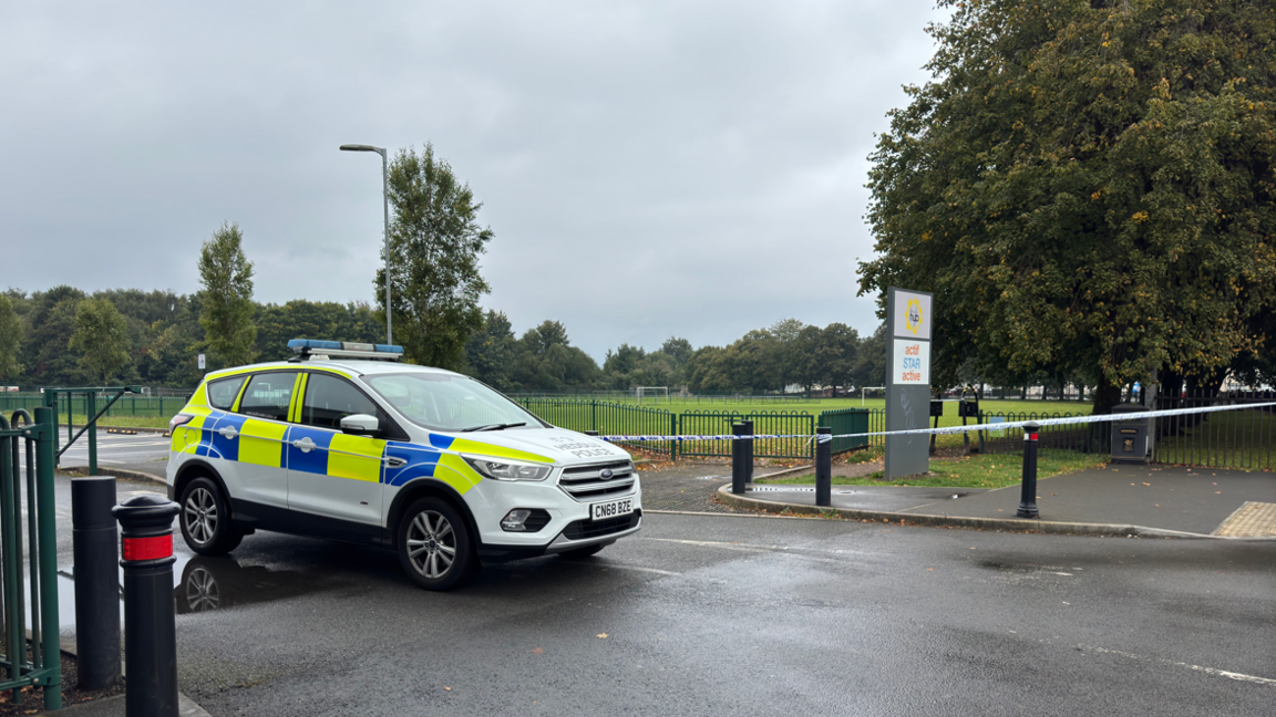 Splott Park cordoned off by police and a police car