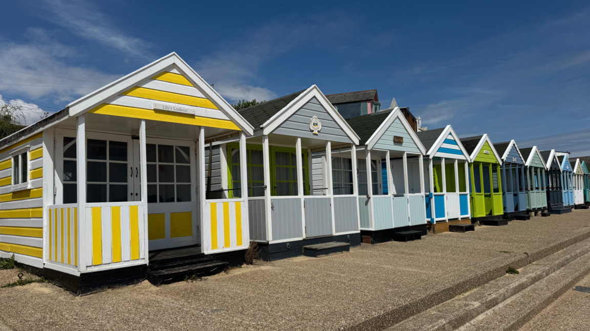 A row of colour beach huts in Southwold