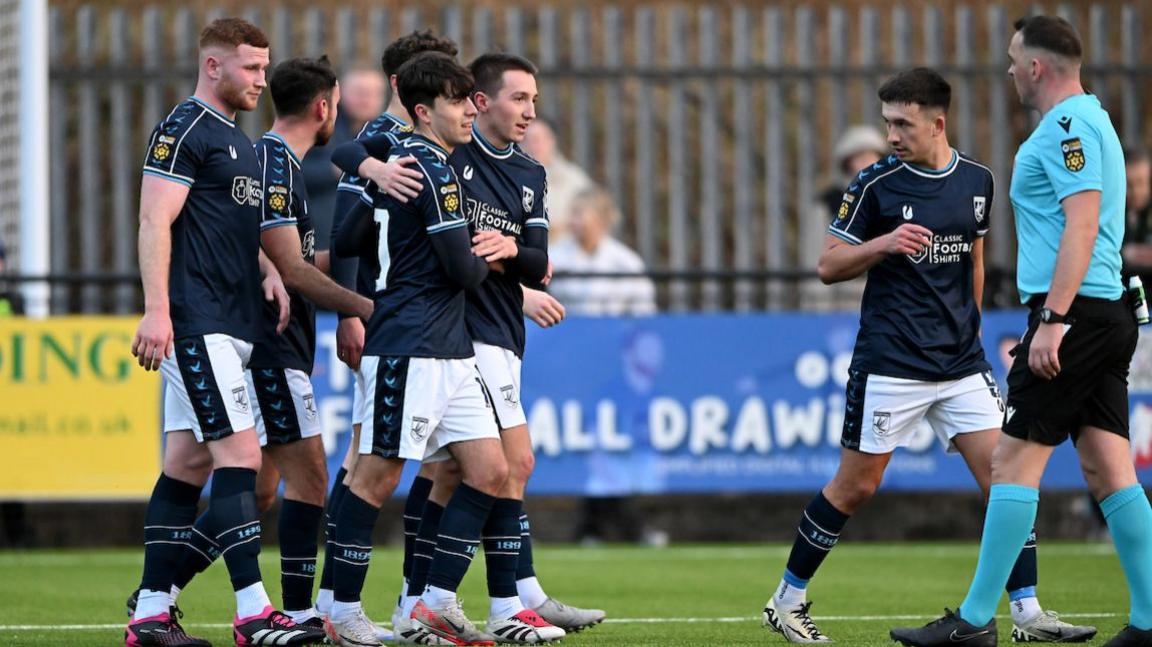 Haverfordwest County players celebrate Dan Hawkins' goal