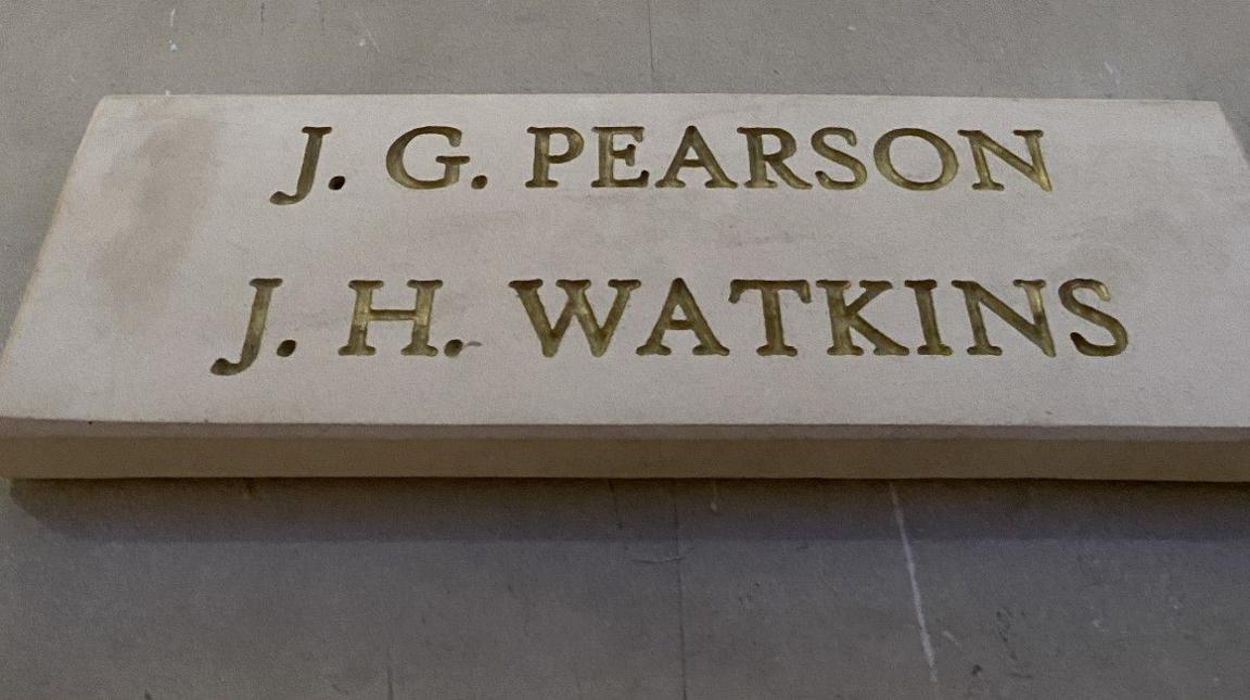 The memorial now naming the two former students, JG Pearson and JH Watkins, with their names on a new raised piece rather than on the previously-constructed memorial.