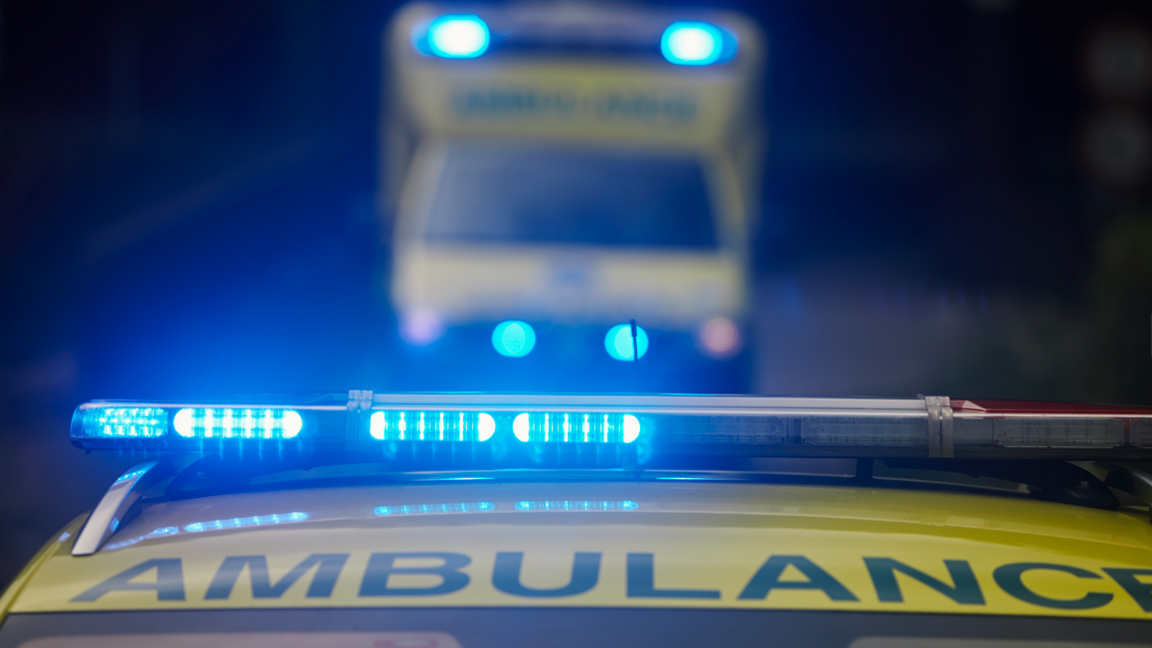 Two ambulance service vehicles 