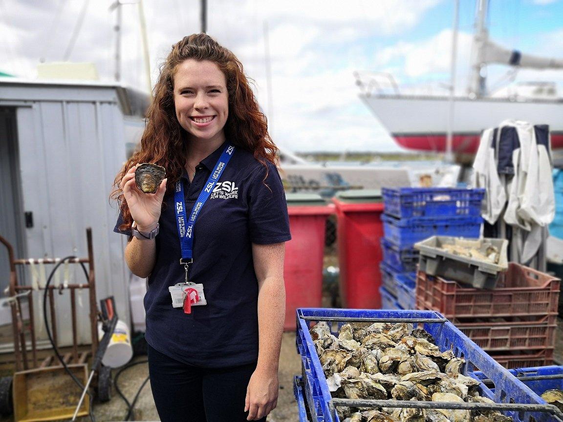 Celine Gamble holding an oyster