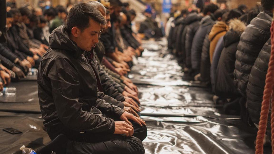 People attending an iftar event in St George's Hall