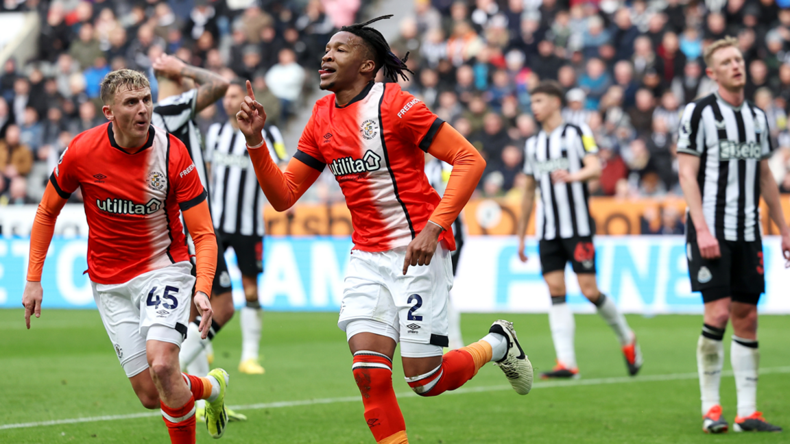 Luton Town players celebrate scoring against Newcastle in the Premier League