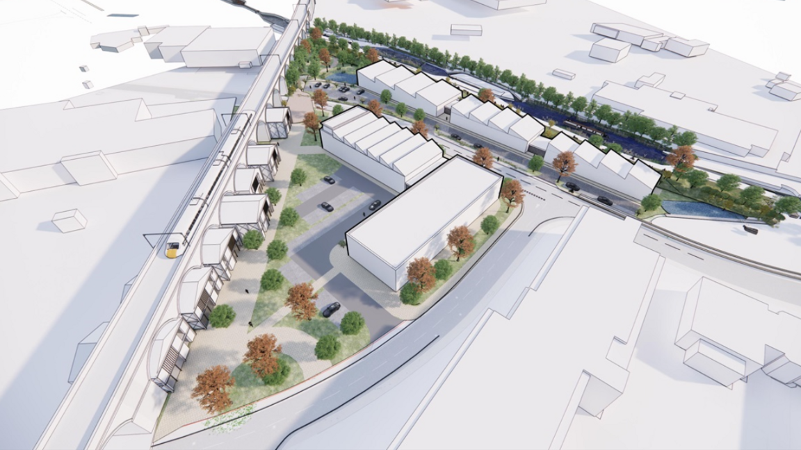 An artist's impression of how the new buildings could look. They are next to a railway track with three blocks of development surrounded by trees.