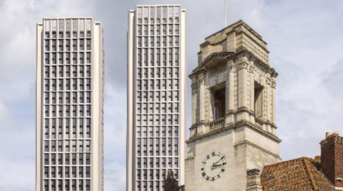 An artist's impression of what the two towers could look like, near a building with a clock