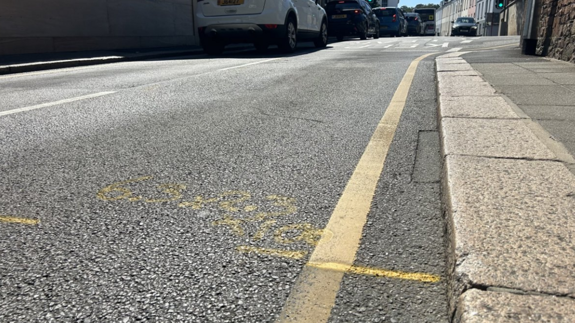 Rouge Bouillon in St Helier. The road has yellow markings on it.
