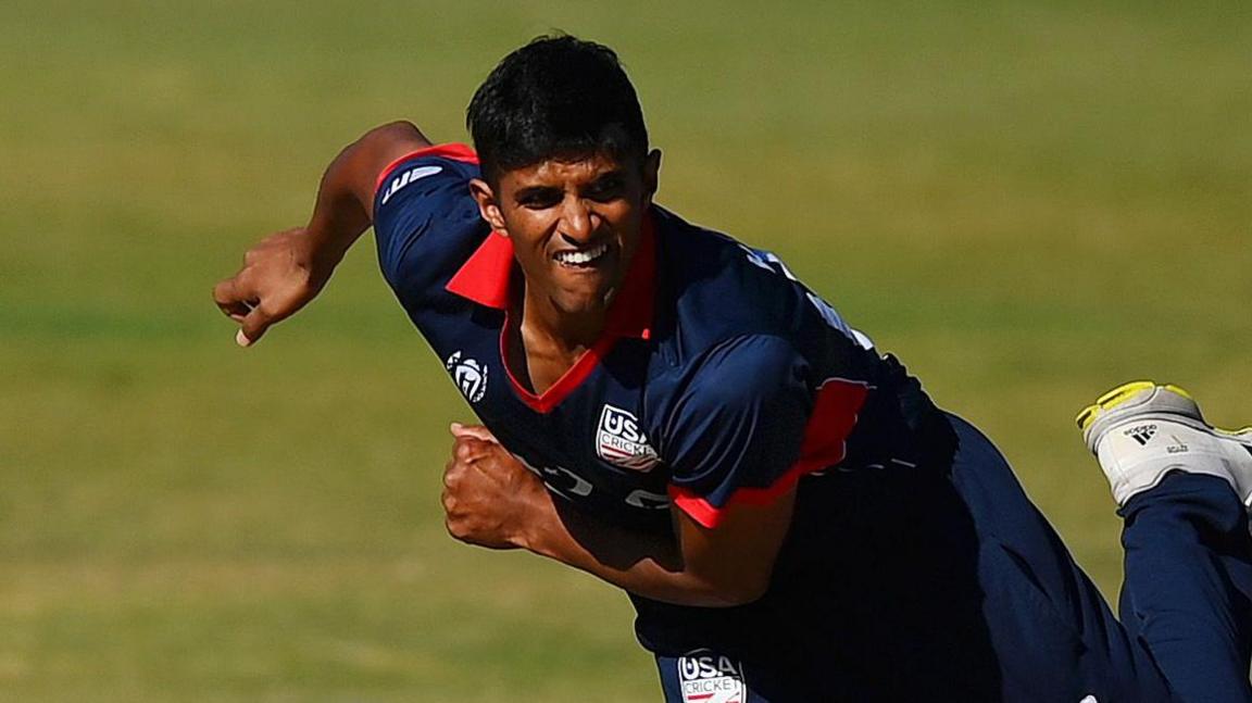 Nosthush Kenjige of USA bowls