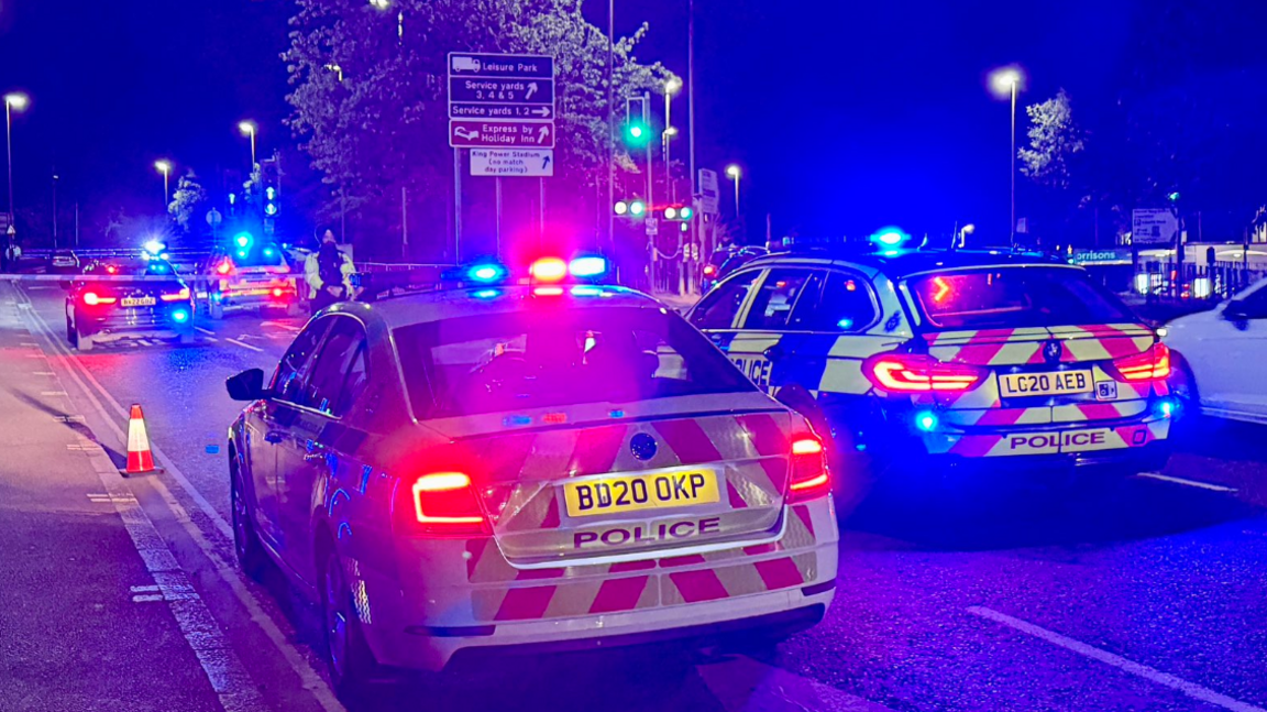 Police cars in Welford Road in Leicester