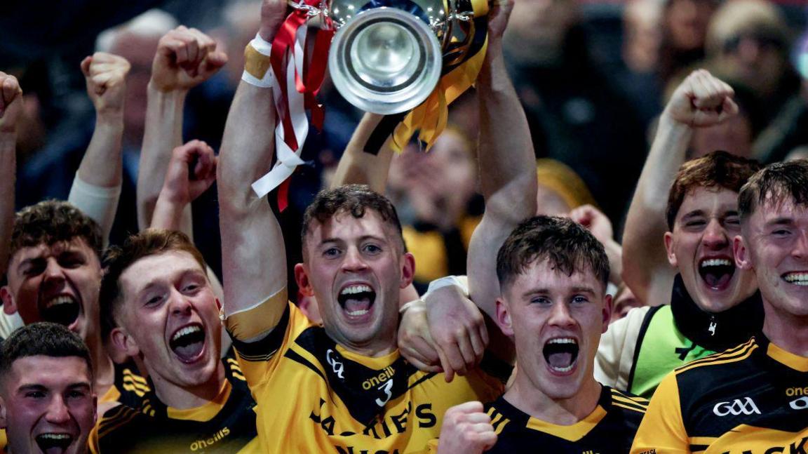 Loughmacory captain Nathan Kelly lifts the O'Neill Cup