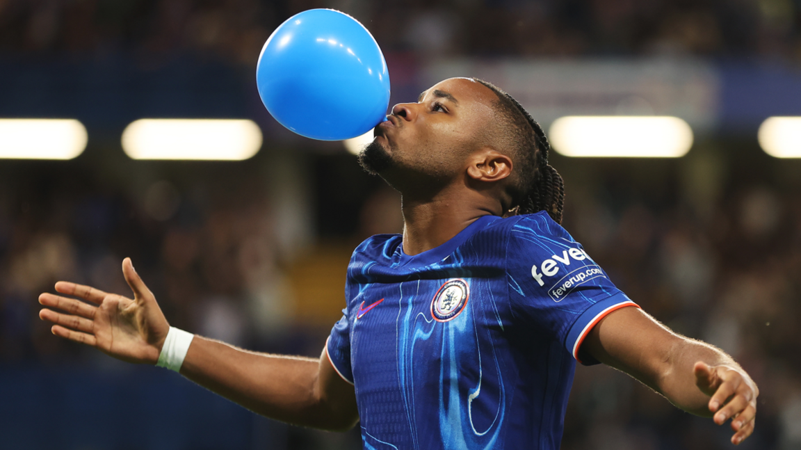 Christopher Nkunku celebrates scoring for Chelsea against Servette in the Conference League play-off first leg at Stamford Bridge