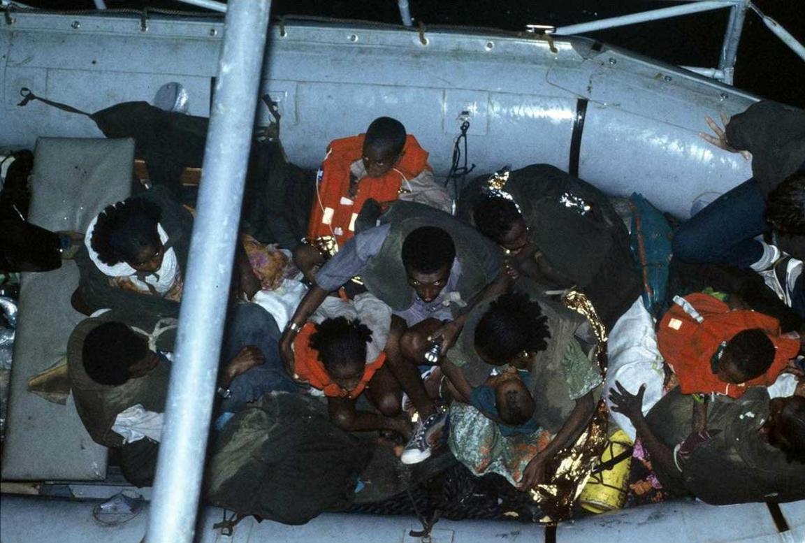 Ethiopian Jews being transported by boat from the beach to a navy ship