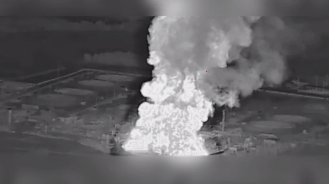 Black and white image of an explosion at an oil pumping station