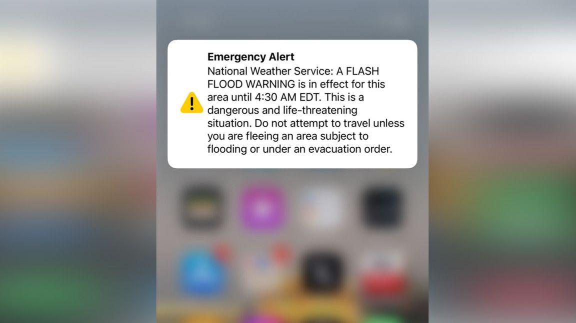 A national weather service alert text warning of flash flooding which could be life-threatening 