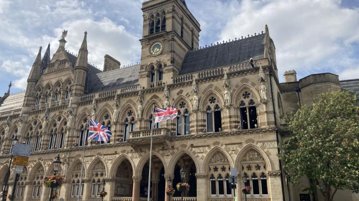 Flags flying outside West Northamptonshire Council HQ