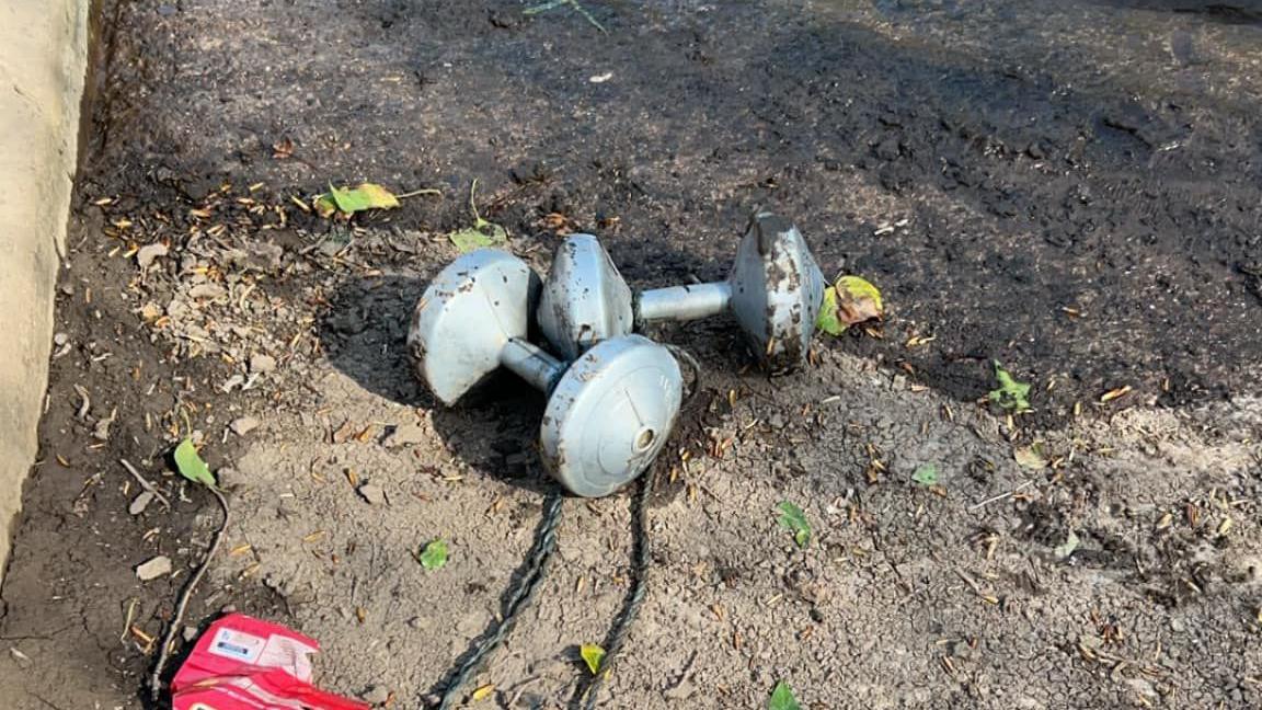 weights on river bank