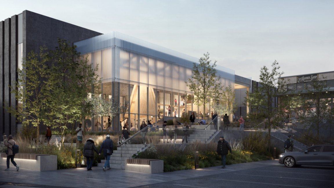 Image shows a computer generated image of a new leisure centre with a main rectangular building. The middle section is lit up and people are walking up stairs. 