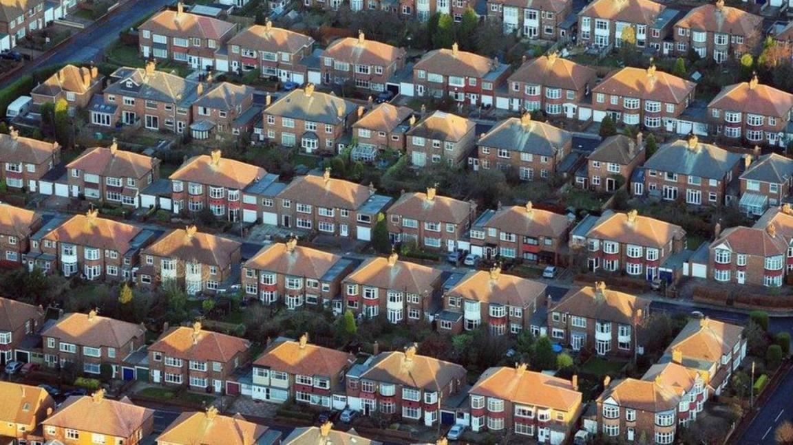 A aerial shot of rows and rows of semi detached houses