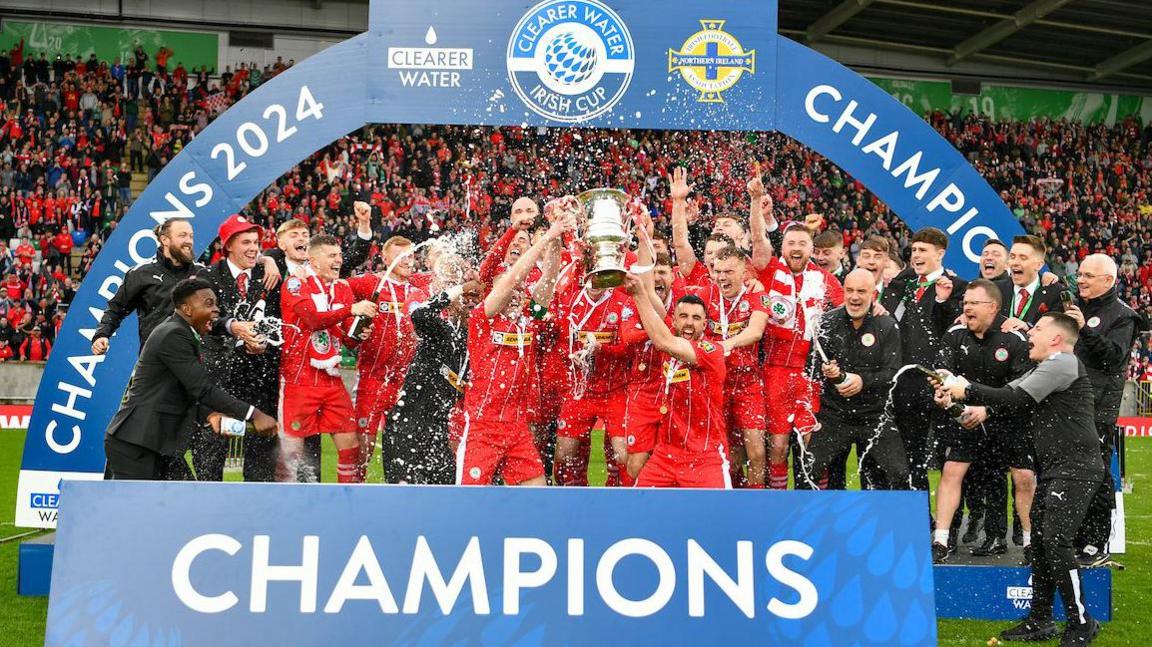 Cliftonville celebrate winning the Irish Cup