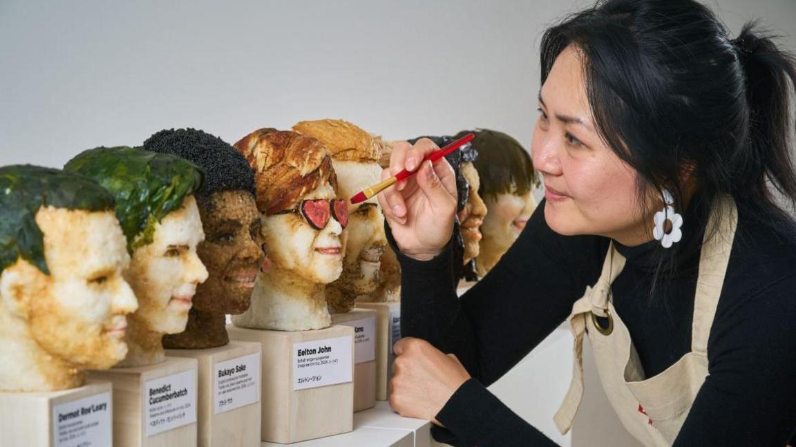 Michelle Wibowo creates sushi celebrity heads