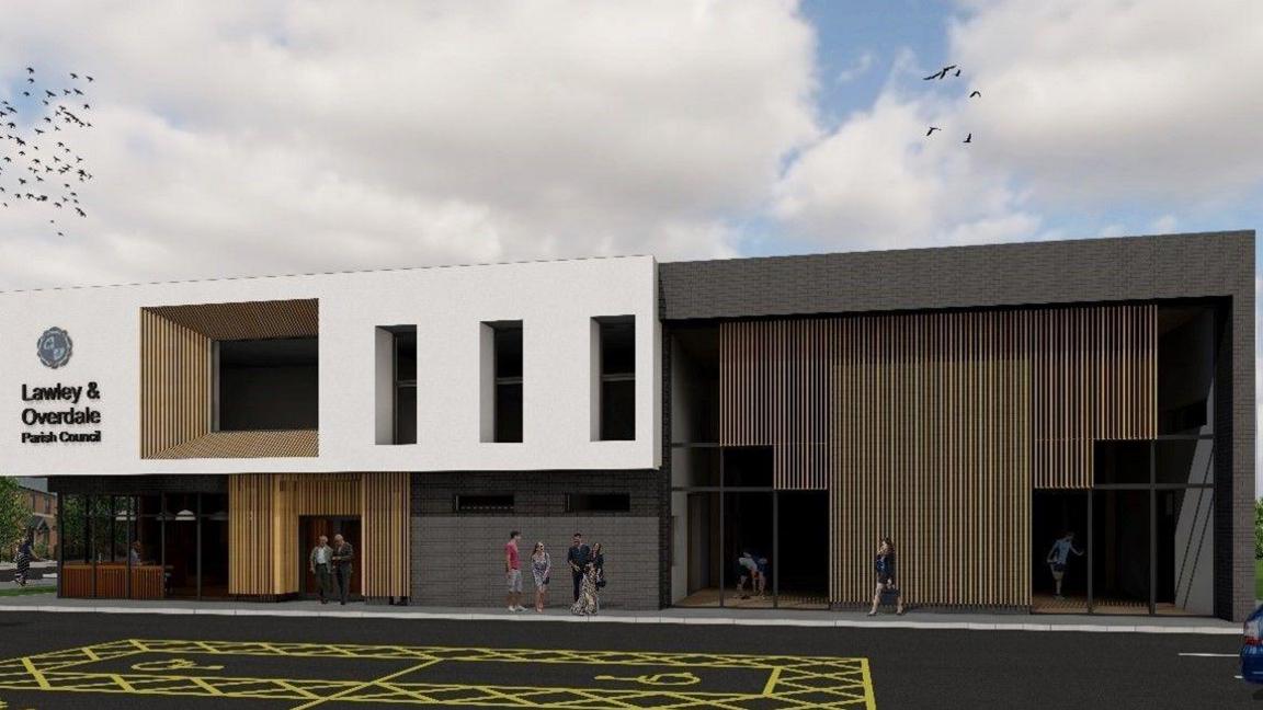 A computer generated image of a community centre. It is two storeys and has a white and wood panel exterior with large glass windows. There is car parking in front of it. There is a sign on it that reads "Lawley & Overdale Parish Council"