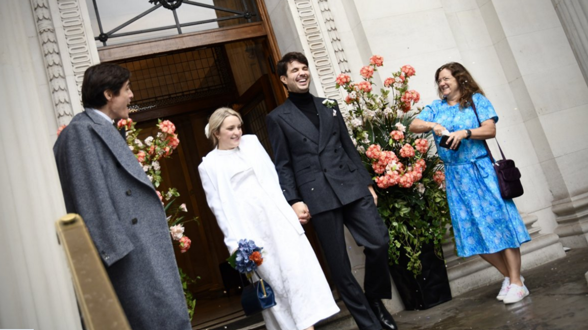 Filippa Evans-Grindrod and Harry Grindrod after getting married at Old Marylebone Town Hall