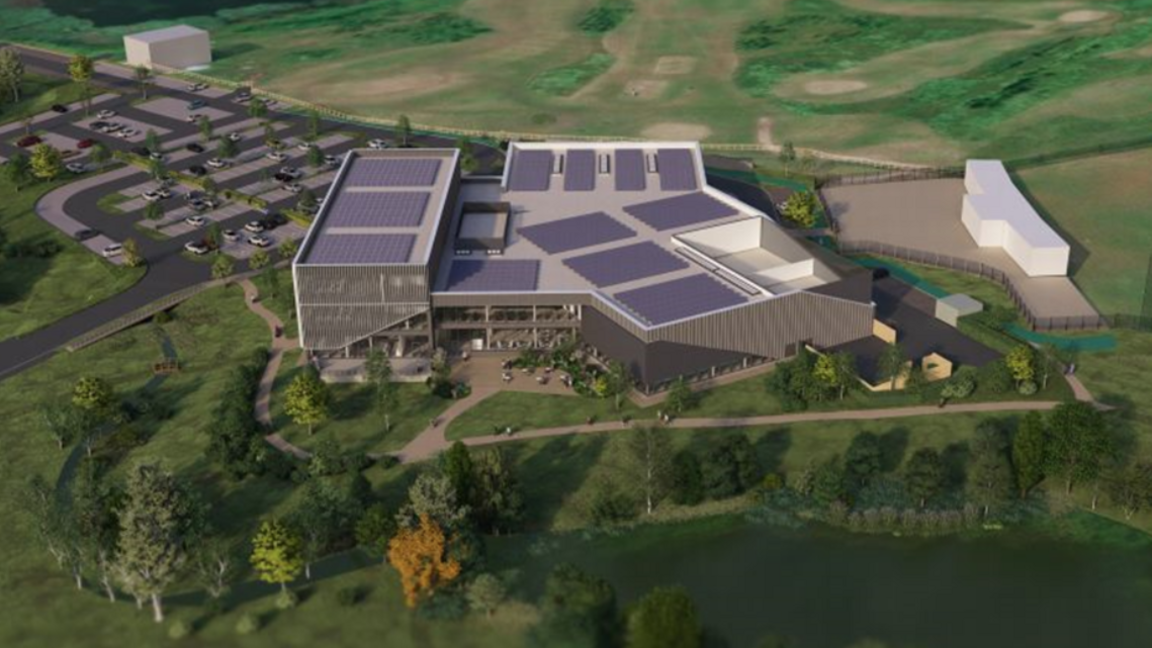 An artist impression of the proposed leisure centre and council office from an aerial view showing a very large building covered in windows with a small outside area. 