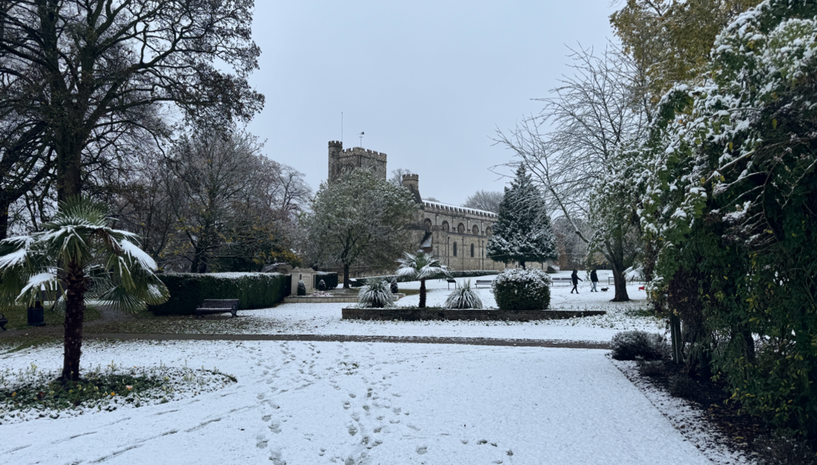 Dunstable Priory Church and War Memorial from Priory Gardens - showy scene with footprints 