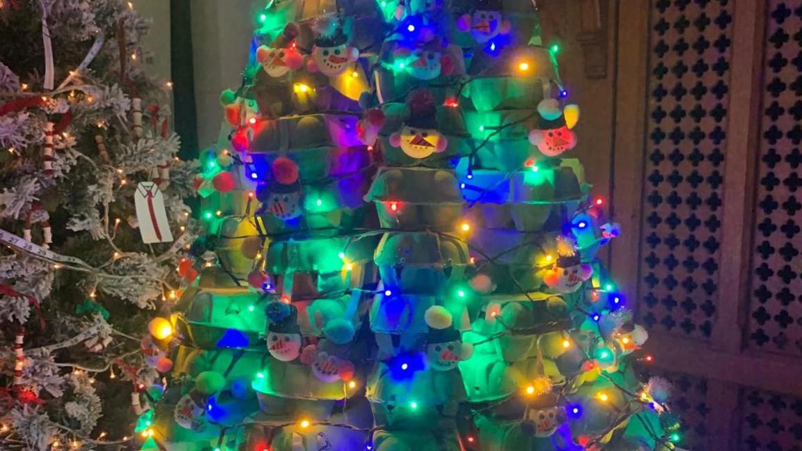 A Christmas tree made entirely from recycled egg cartons