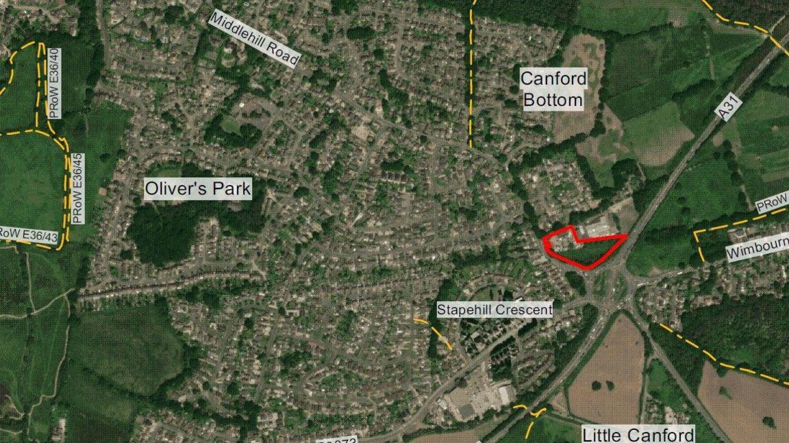 An aerial image of the Canford Bottom site, with Canford Bottom roundabout. The site where Aldi proposes to build its new store is circled in red. Nearby locations such as Little Canford and Wimborne are marked.