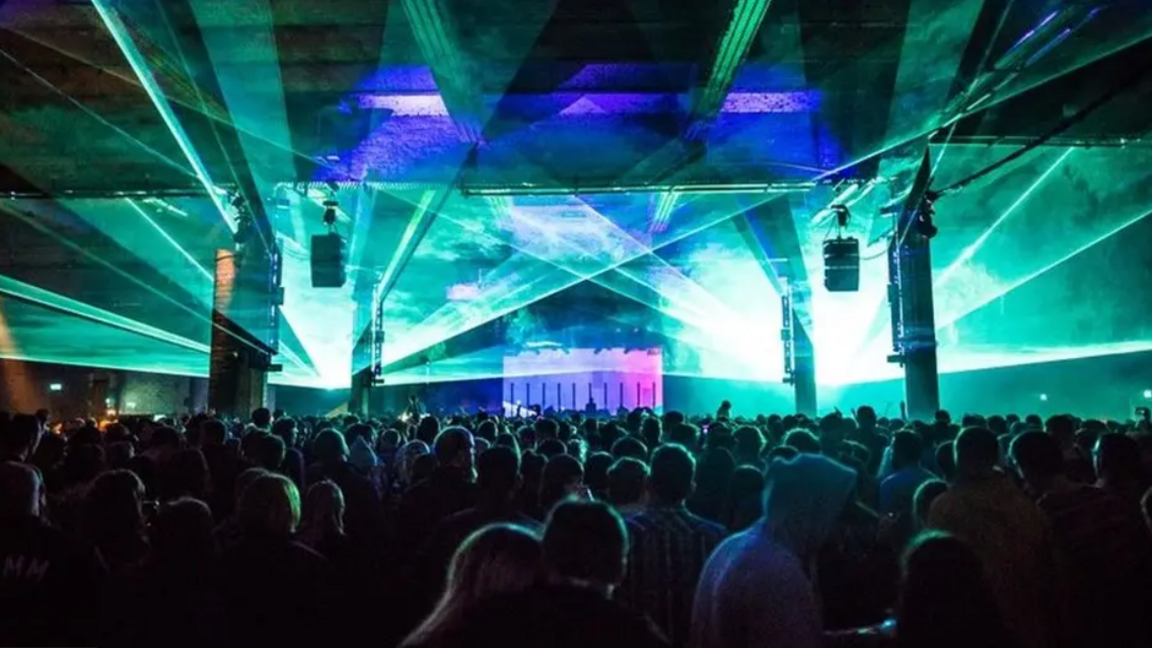 The Warehouse Project crowds enjoying a night with lights and music