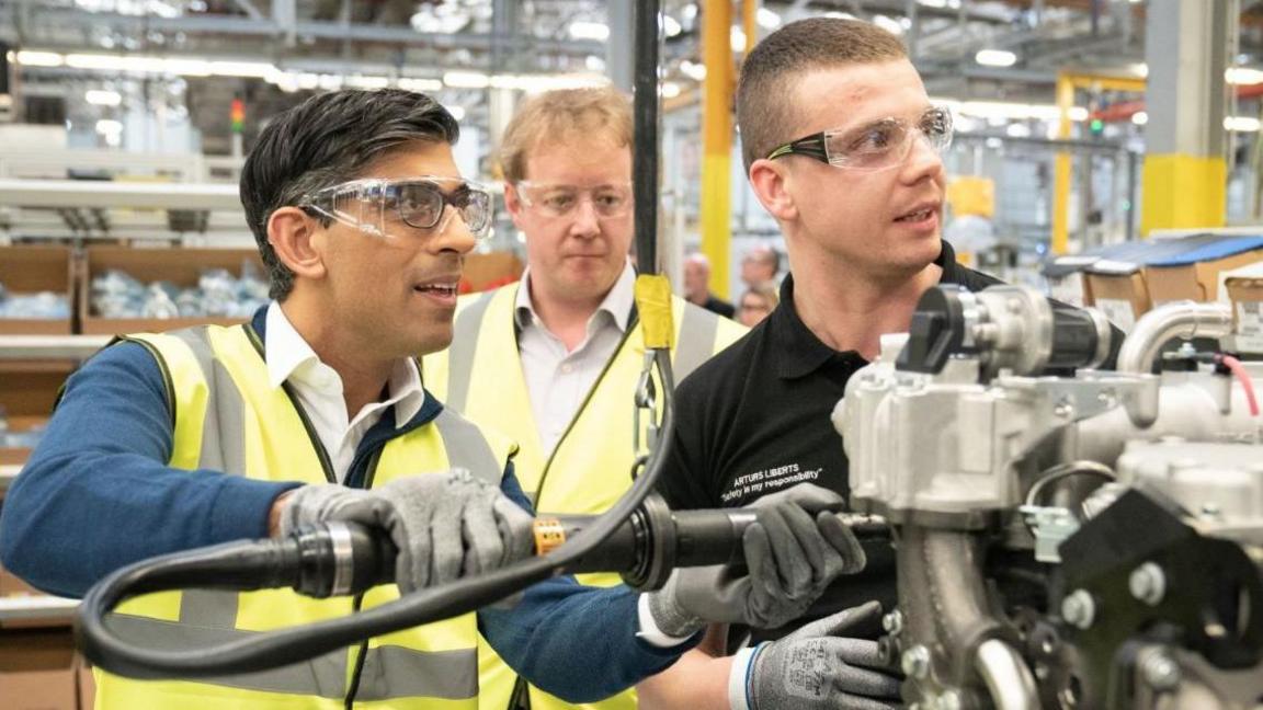 Prime Minister Rishi Sunak meets apprentices and staff during a visit to the Caterpillar factory who produce engines for construction, agricultural and electrical machinery in Peterborough, Cambridgeshire, as he campaigns for the local elections in May 2023.