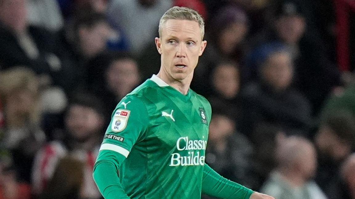 Adam Forshaw in action for Plymouth