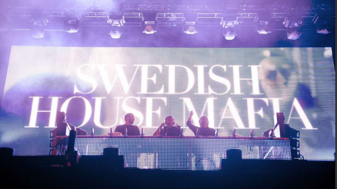 The three DJs of Swedish House Mafia on stage
