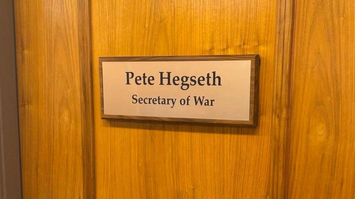 A doorplate reads 'Pete Hegseth, Secretary of War'