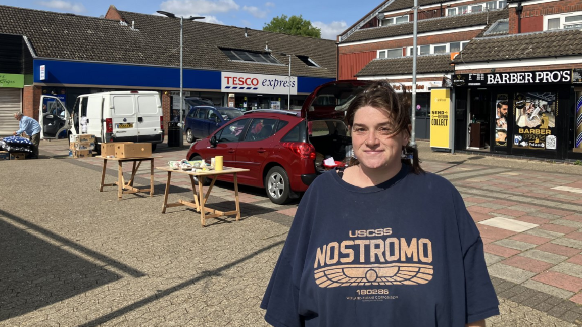 Vicky Hammond standing in a market square looking at the camera