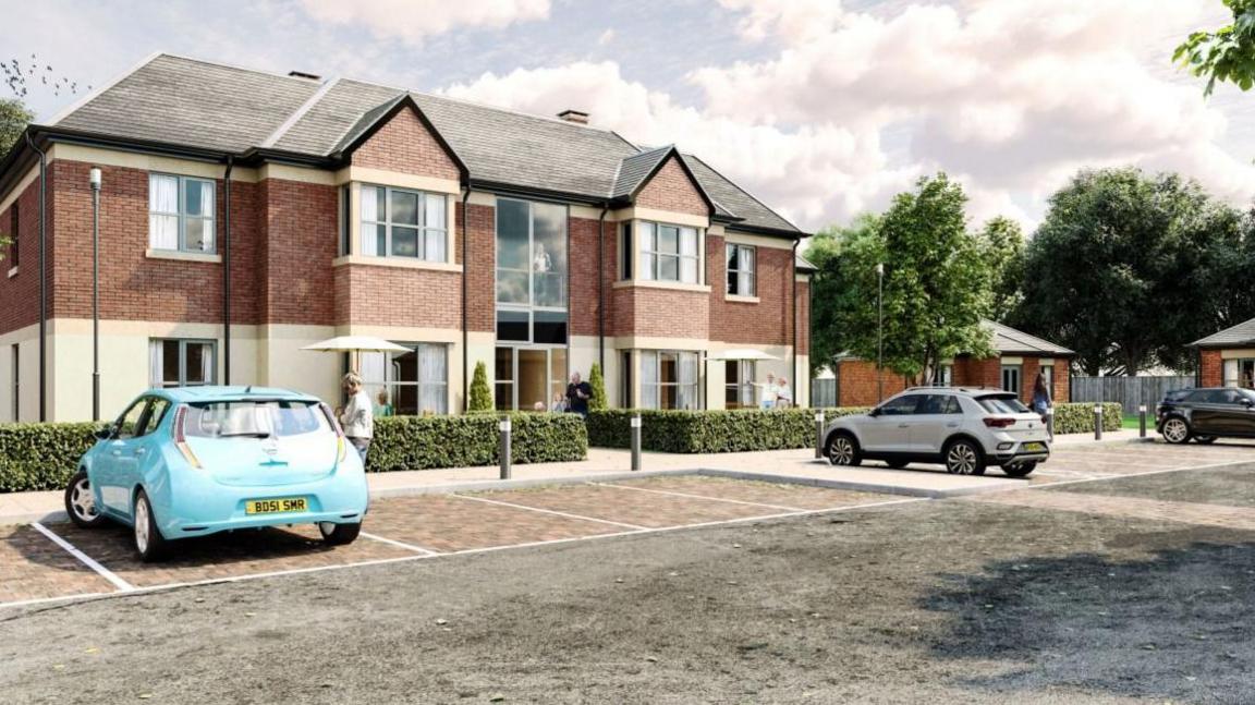 Computer simulation of a two-storey brick-built care home with entrance in the centre.  There is a low hedge in front of the property and a car park with three cars.  There is a bungalow in the distance.