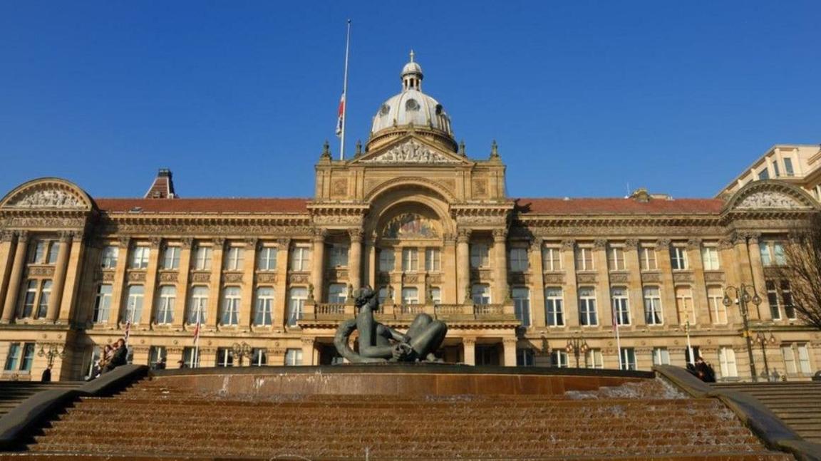 Birmingham City Council House in the city centre, featuring a central dome at its highest point and columns outside in front of multiple floors. 