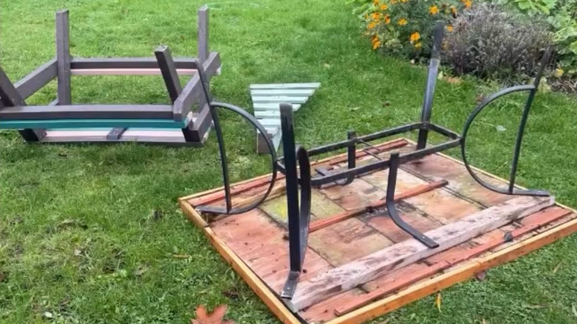 Overturned tables on a lawn