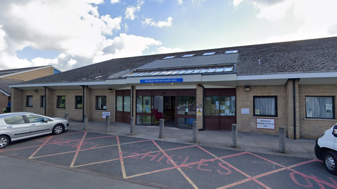 Mental health unit with emergency parking outside