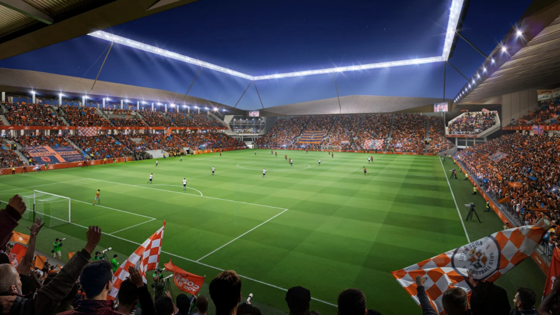 A CGI image of inside the proposed new Luton ground from a stand behind the goal, looking at the other stands. The stand to the left is two-tier, in front is one-tier and to the right is two-tier. All have fans inside, mostly wearing orange.