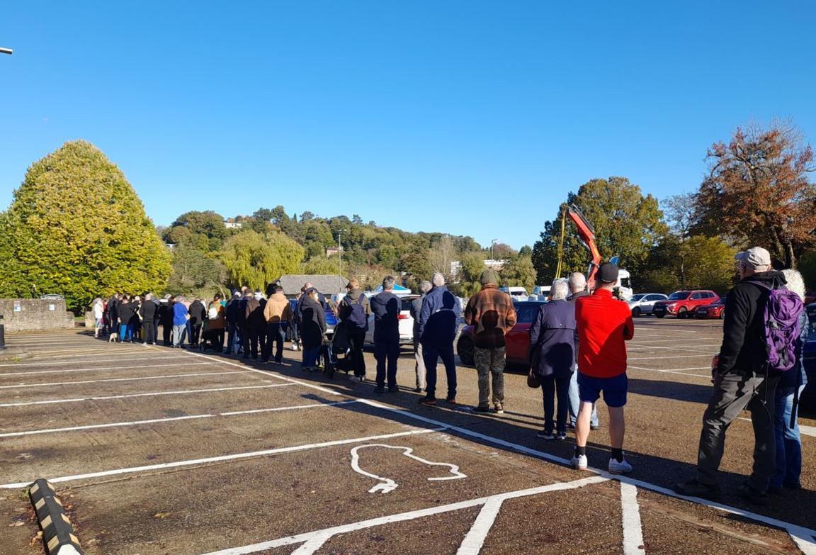 People queuing in the Crown Court carpark 