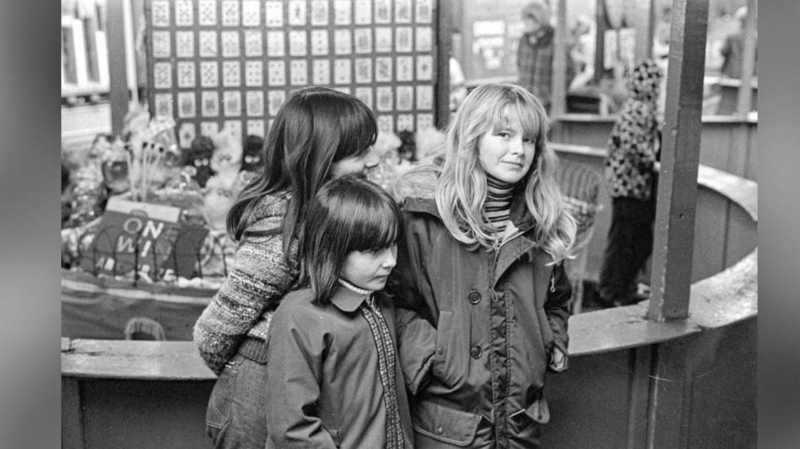 Children pictured at the Cross Lane fair in Salford