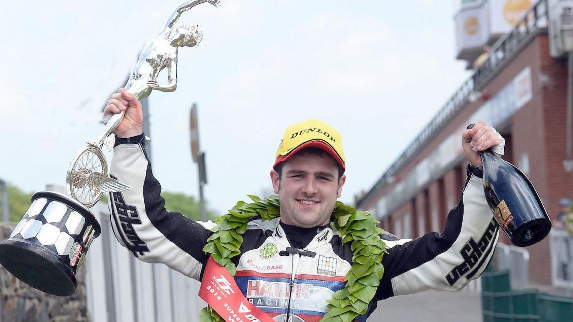 Michael Dunlop after winning for BMW