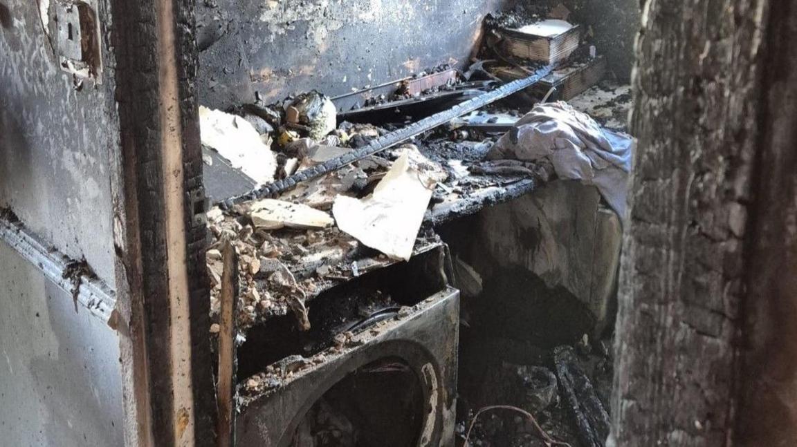 A picture of a heavily burned out room 