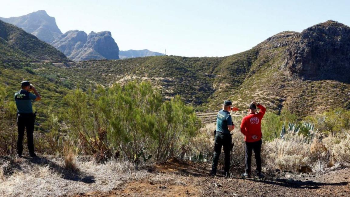 Rescue workers look out on the harsh terrain in Tenerife as search for Jay Slater from Lancashire continues