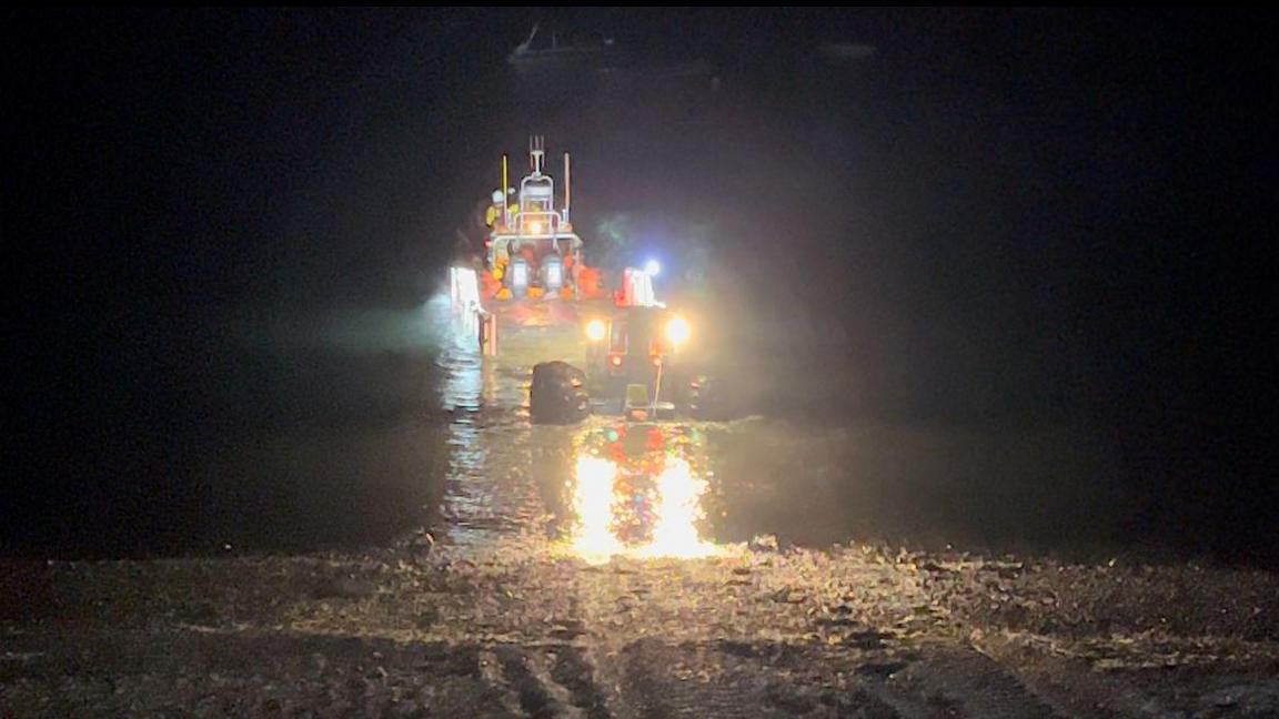 RNLI rescue lifeboat in the sea at night